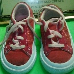 Burgundy and orange sneakers